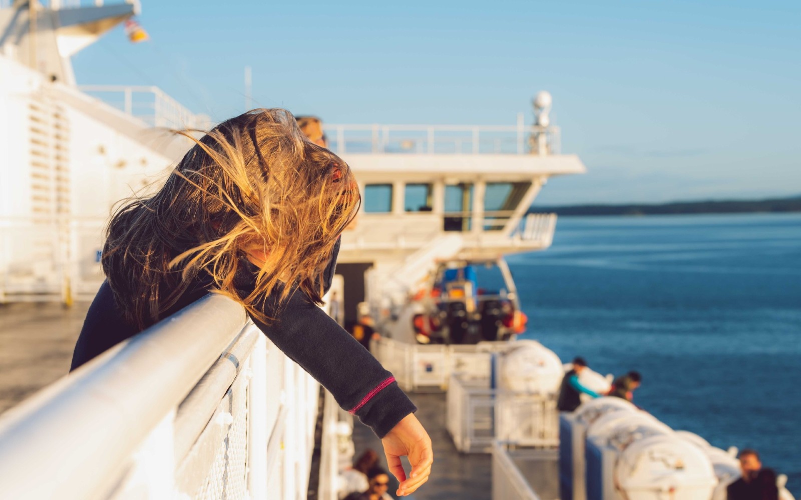 A girl enjoys the views on the Vancouver to Victoria ferry