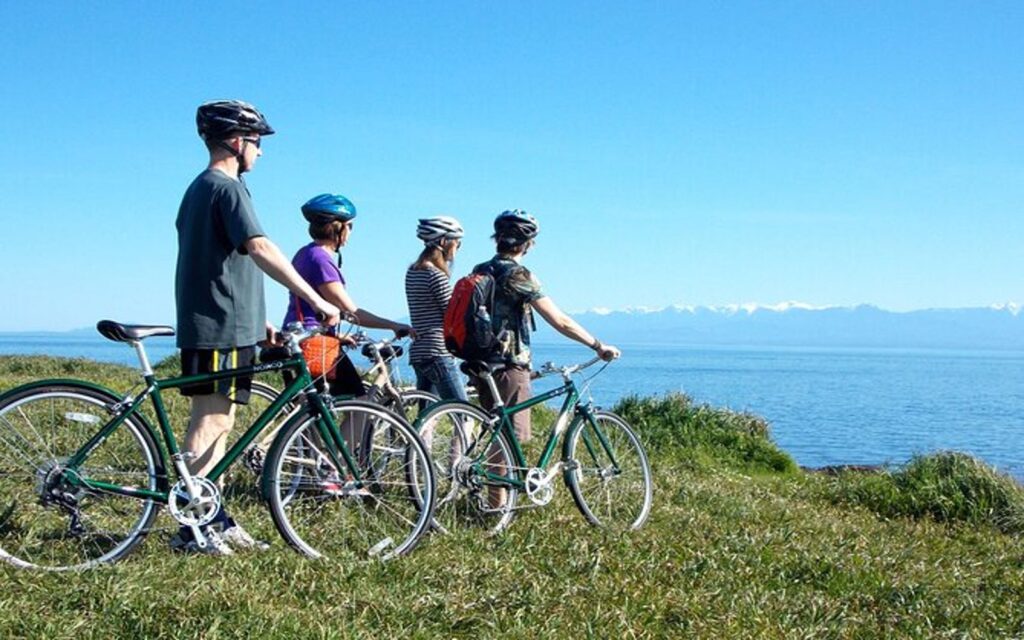 A group admires the scenery on a Victoria bike tour