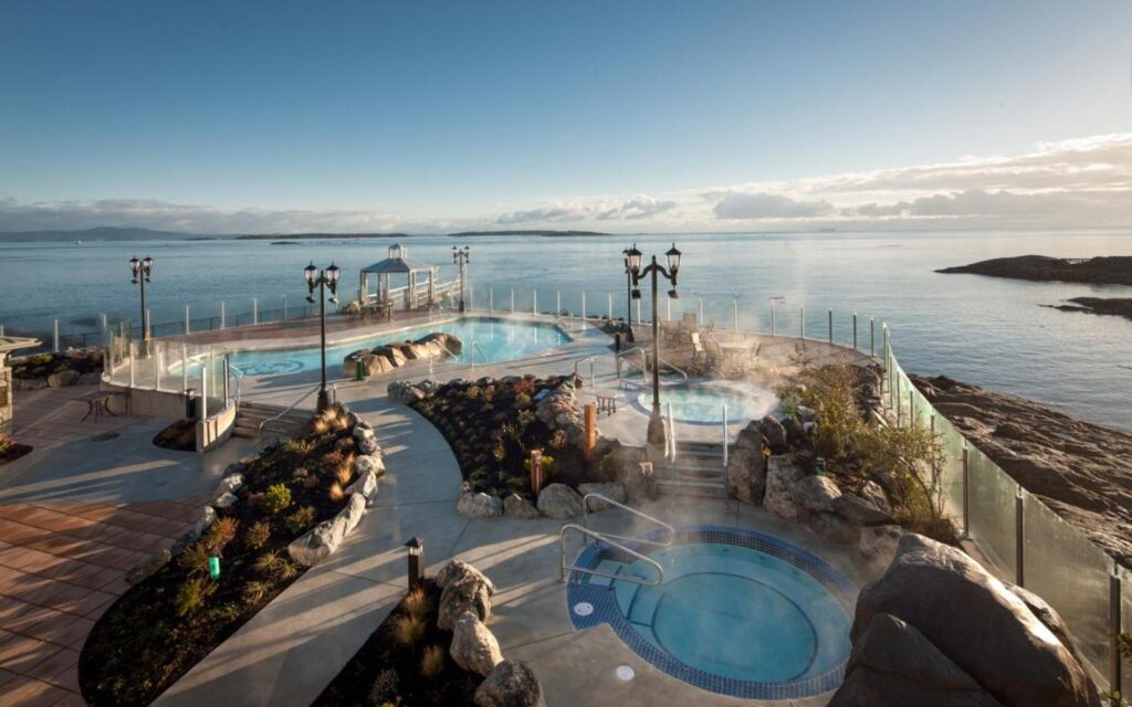 a shot of the pool and hot tubs at the oak bay beach hotel on a cool morning.