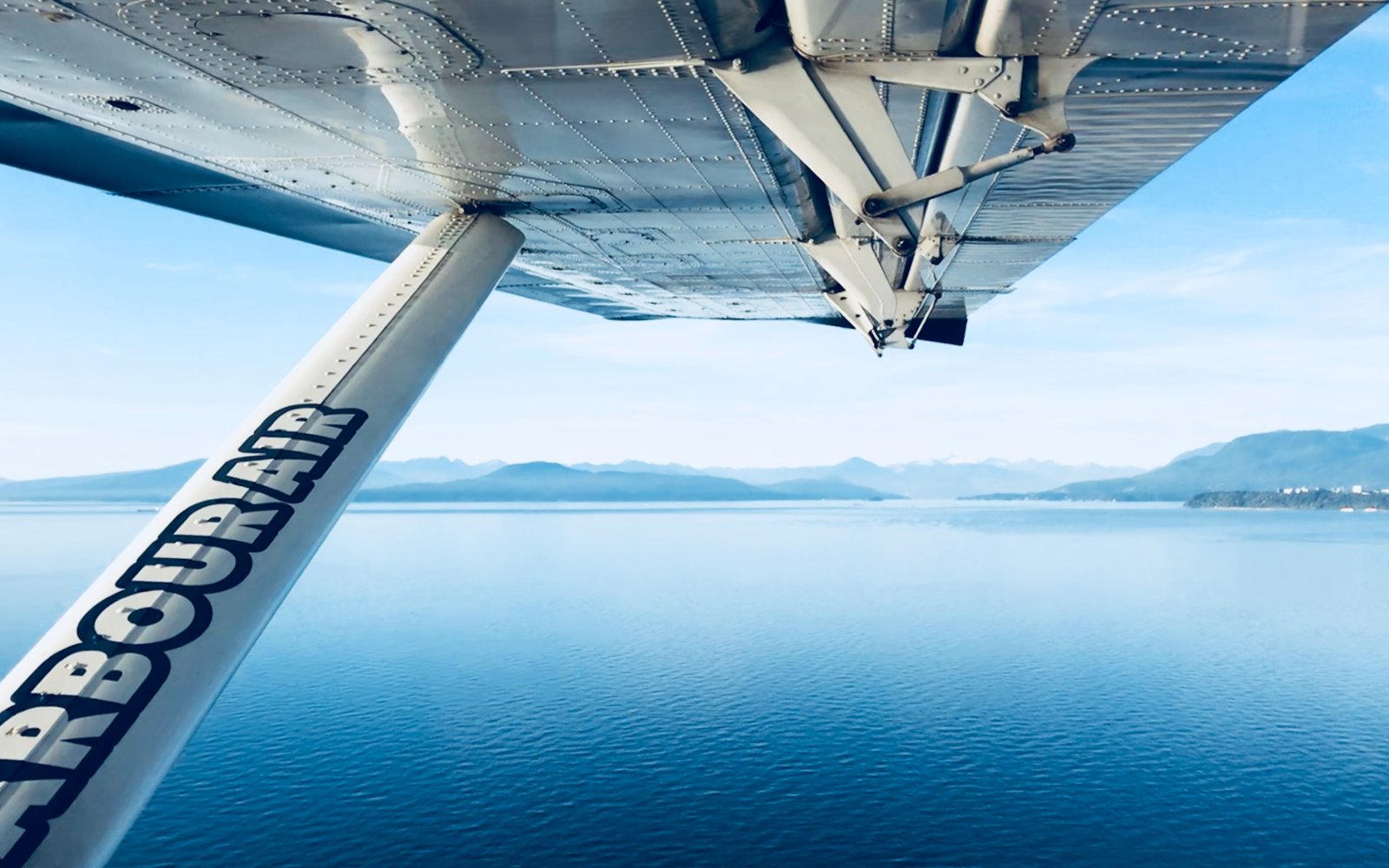 an aerial shot of the view from the vancouver to victoria seaplane.